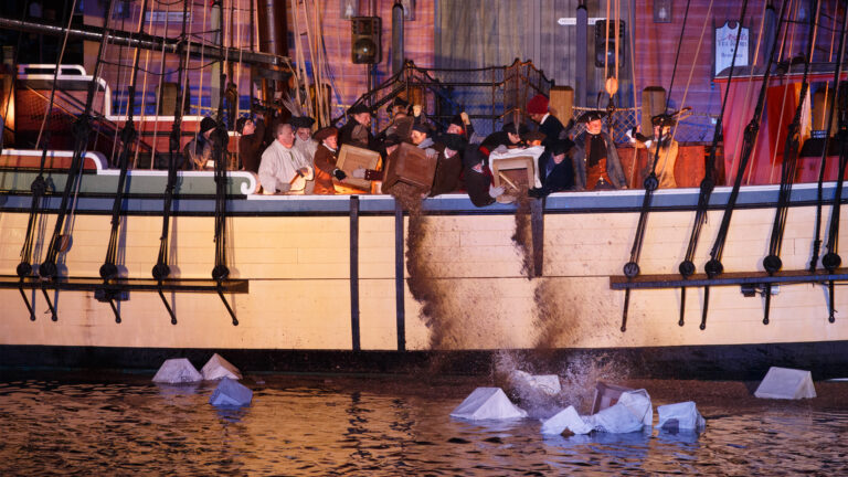 boston tea party reenactment - the throwing of the tea