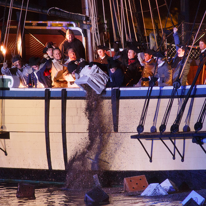 throwing tea into the boston harbor