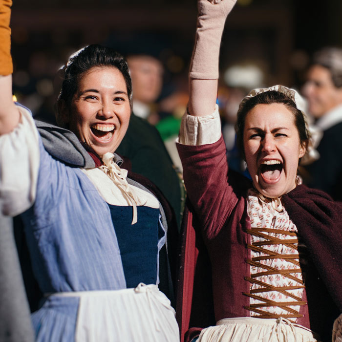 costumed volunteers at the december 16th celebration outside faneuil hall